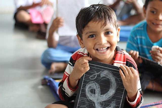 A school boy smiling